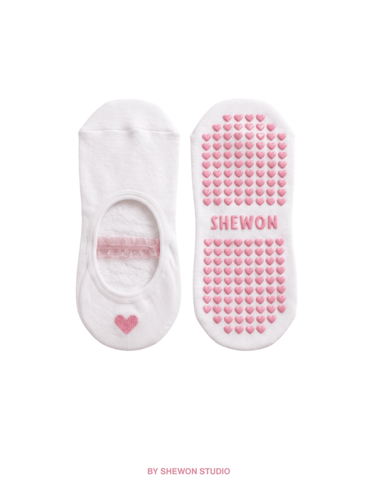 White and pink ballet Pilates grip socks with short straps