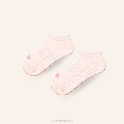 Pastel pink heart-shaped ankle Pilates grip socks for women