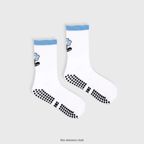 White and blue floral Pilates crew grip socks with flower design